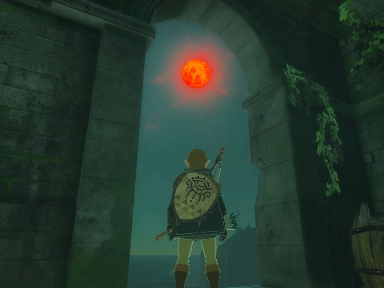 Skjermdump fra spillet The Legend of Zelda: Tears of the Kingdom med Link som ser mot en brennende sol