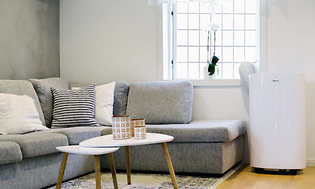 SDA - Indoor Climate - picture of portable aircon in living room