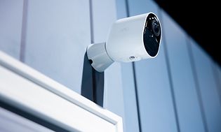 Surveillance camera on house