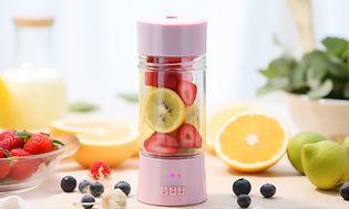 Pink smoothie blender with fruits