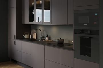 Umber EPOQ Trend kitchen with integrated oven and dark grey countertop, integrated stove and sink 