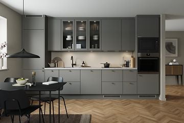 EPOQ Kitchen - Trend Warm Grey - terrazzo laminate worktop - table - pendant - rug - glass cabinets - herringbone
