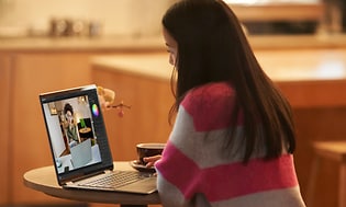 Computing - Widows 11 - Woman taking a meeting on a laptop