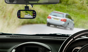 Car with dashboard camera following a car